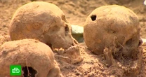 Mass grave of women and children unearthed at ex-Nazi concentration camp