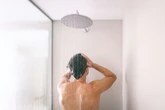 Hot showers could make you 'go bald' as they do 'more harm than good' for your scalp