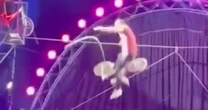 Stuntman plunges 2​3ft from high wire in horror bicycle act accident in front of crying children