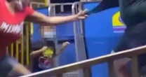 Ride operator attacks mum getting off Ferris wheel with kids – and is beaten up by crowd