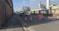 Man shot dead yards from hospital and another injured as police launch murder probe