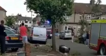 'Tornado' rips through London leaving trail of destruction as bins fly through air