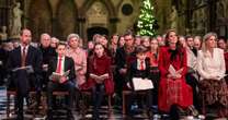 Proud Prince William and Princess Kate pictured beside all three children at Christmas concert