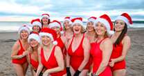 Brave Brits strip off and plunge into icy water for Christmas Day dip at UK beaches