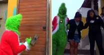 Bizarre moment cop dresses as Grinch to raid family of cocaine dealers