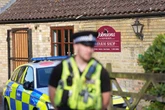 Carers 'staring at phones' face neglect probe after boy 'thrown into crocodile pit'