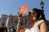 Heatwave warning as 34C UK to be hotter than Ibiza – with sports days cancelled