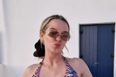 Helen Flanagan's curves slip out from under dangerously small bikini top