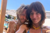 Davina McCall wows in small bikini as she flaunts incredible abs on loved-up getaway