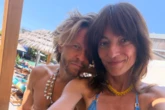 Davina McCall looks happy and healthy as she flaunts ripped abs in bikini on holiday