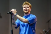 Alex Warren has denied his record-breaking song features crude lyrics