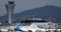 LiveAlaska Airlines LIVE: Huge delays as ALL planes halted at airports amid IT outage