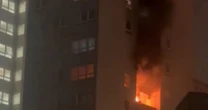BREAKING: Horror as firefighters battling major flat fire attacked with lit fireworks