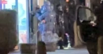 Armed police hunting Abdul Ezedi raid pizza restaurant 300 miles away from chemical attack