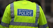 Three arrested at asylum hotel protest 'with kids present' as officer punched
