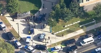LiveUMass Boston 'gunshots' LIVE as terrified university students run for cover
