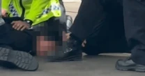 Boy, 16, jumped on by cops as he brandished costume gun near Premier League game
