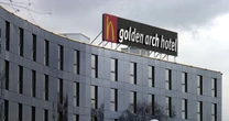 Inside forgotten McDonald's hotel with golden arch beds and futuristic showers