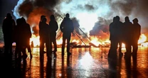 Paris riots erupt as protesters burn cars and deface landmarks across city