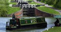 Woman crushed to death between narrow boat and side of canal after falling in as husband watched helplessly