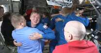 Astronauts hug SpaceX Falcon 9 rescuers after spending 9 months stranded on ISS