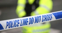 Armed cops swarm Manchester street as school locks down amid 'man with knife' reports