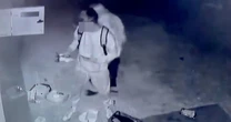 Boy, 17, arrested after CCTV shows two people destroying defibrillator at football club