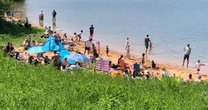 Child left in hot car as police hit out at 'bare chested hooligans' in 'day of shame'
