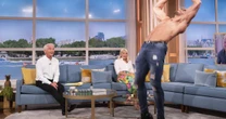 Holly Willoughby left red-faced on This Morning by topless Dreamboys hunk