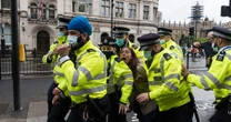 Three officers injured as violence erupts at 'Freedom Day' anti-lockdown protest