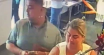 Couple who yelled at police for saving dogs in hot car filmed 'stealing from cafe'