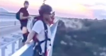 Eagle-eyed base jumper saves thrill-seeker about to fall to his death after epic blunder
