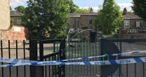 Children's play area taped off by police after woman raped and man, 20, is arrested