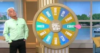 Phil Schofield sneers at 'cheap' This Morning beach towel given away as Spin To Win prize