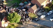 Drone captures 300-strong street party which descended into violence with teen stabbed
