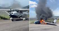 Horror moment plane bursts into flames in mid-air as trainee pilots make narrow escape