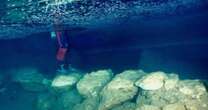 6,000-year-old bridge built by ancient humans is discovered in secret underwater cave