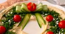 Impress Christmas guests with ultimate snack dish featuring festive bow