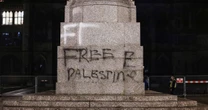 Two men arrested for daubing 'free Palestine' in red graffiti on Cenotaph in Rochdale