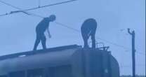 Horror moment teen suffers electric shock after climbing on top of Russian train