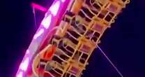 Fairground terror moment as five people rescued from rollercoaster stuck upside-down