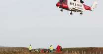 Major rescue operation launched after man drops down 20ft cliff face as three arrestedCrime