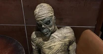 Police hunt thieves who ran off with pub's iconic mummy figurine in bizarre 'kidnap'