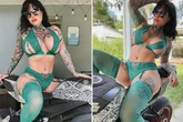 Tattoo model goes for racy 'ride' as she poses on motorcycle in saucy lingerie