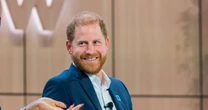 Grinning Prince Harry breaks cover after bombshell interview saying King 'won't speak to him'