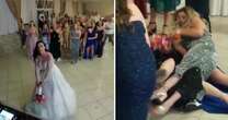 Moment wedding bouquet toss turns into brawl as three guests fight to grab it