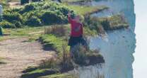 Tourist pictured risking life for selfie by 'very fragile' 530ft cliff edge at UK beauty spotSelfies