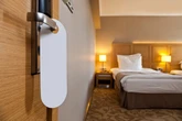 Flight attendant tells travellers to always leave a towel by hotel room door