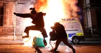 Bristol riots: Seven arrested and 12 police officers hurt as burnt-out cars litter ravaged city