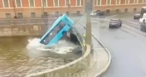 Bus full of passengers crashes off bridge into St Petersburg river with at least seven killedBus Accident